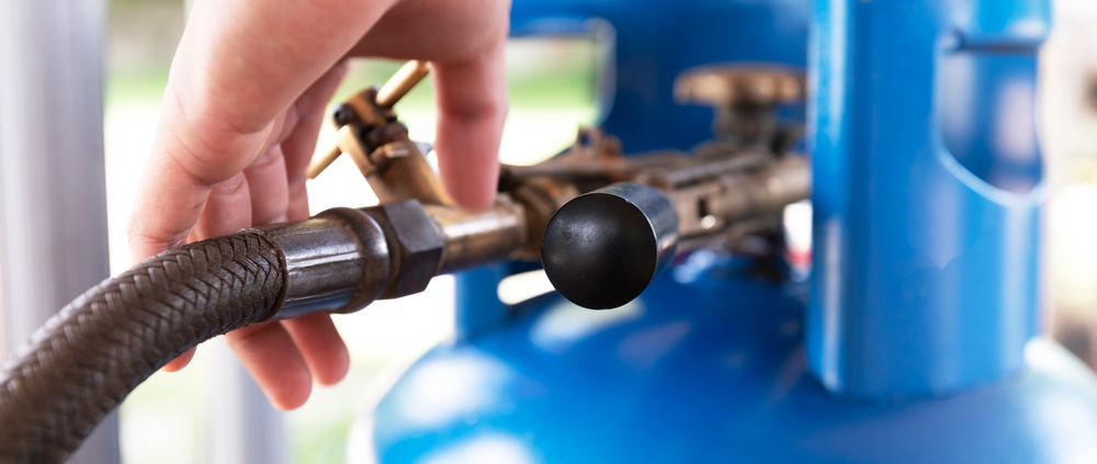 Consumer checking propane valve