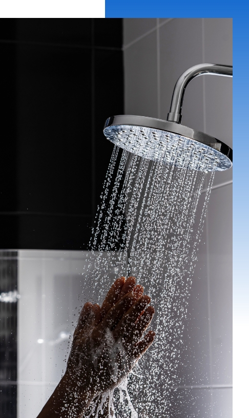 Shower with hand testing heated water