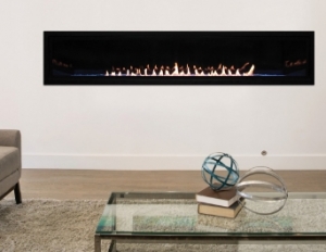 high-efficiency fireplace (1) A long looking fireplace behind a glass coffee table